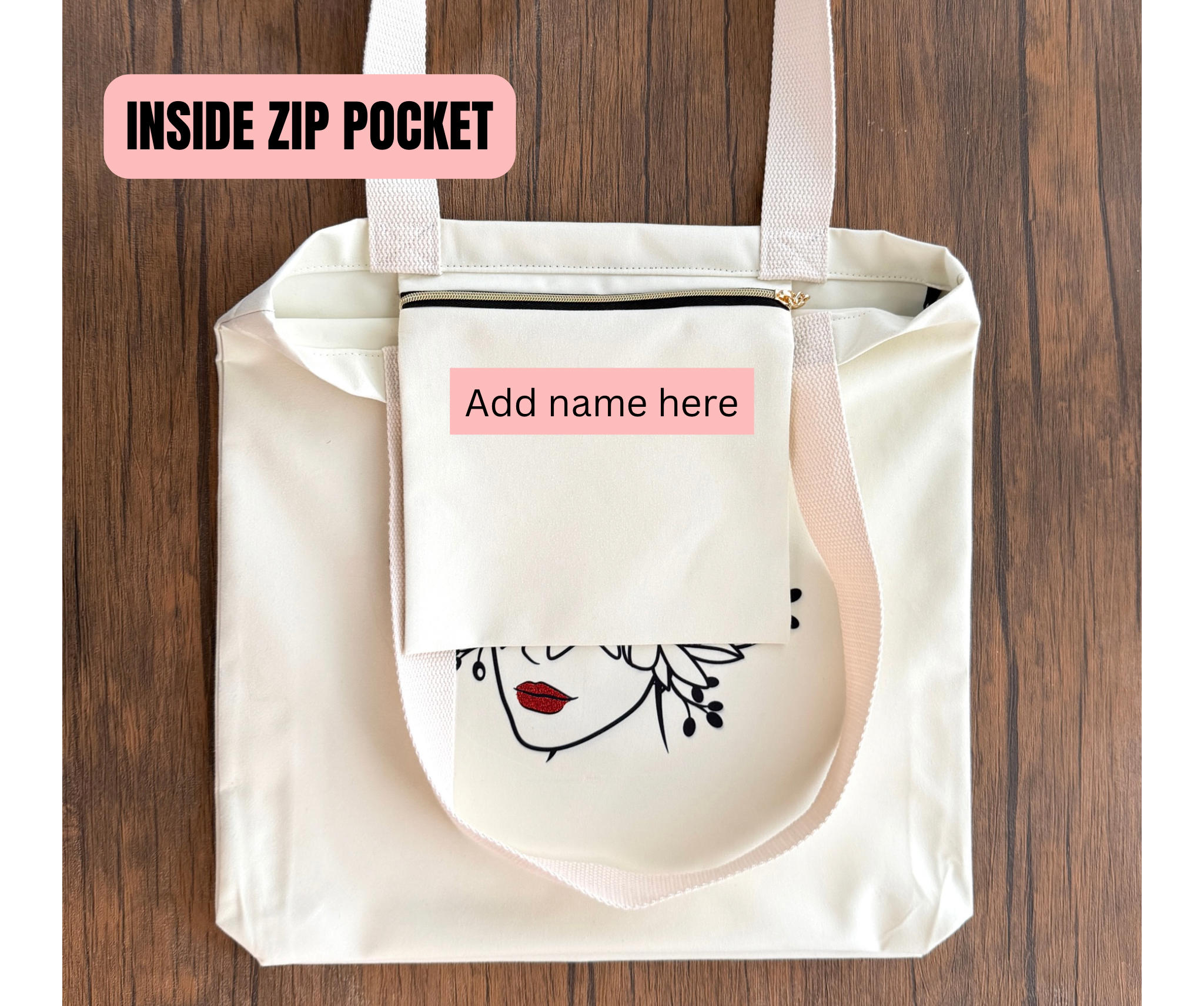 White tote bag with a face design and inside zip pocket on a wooden surface, handmade tote bag gift for her
