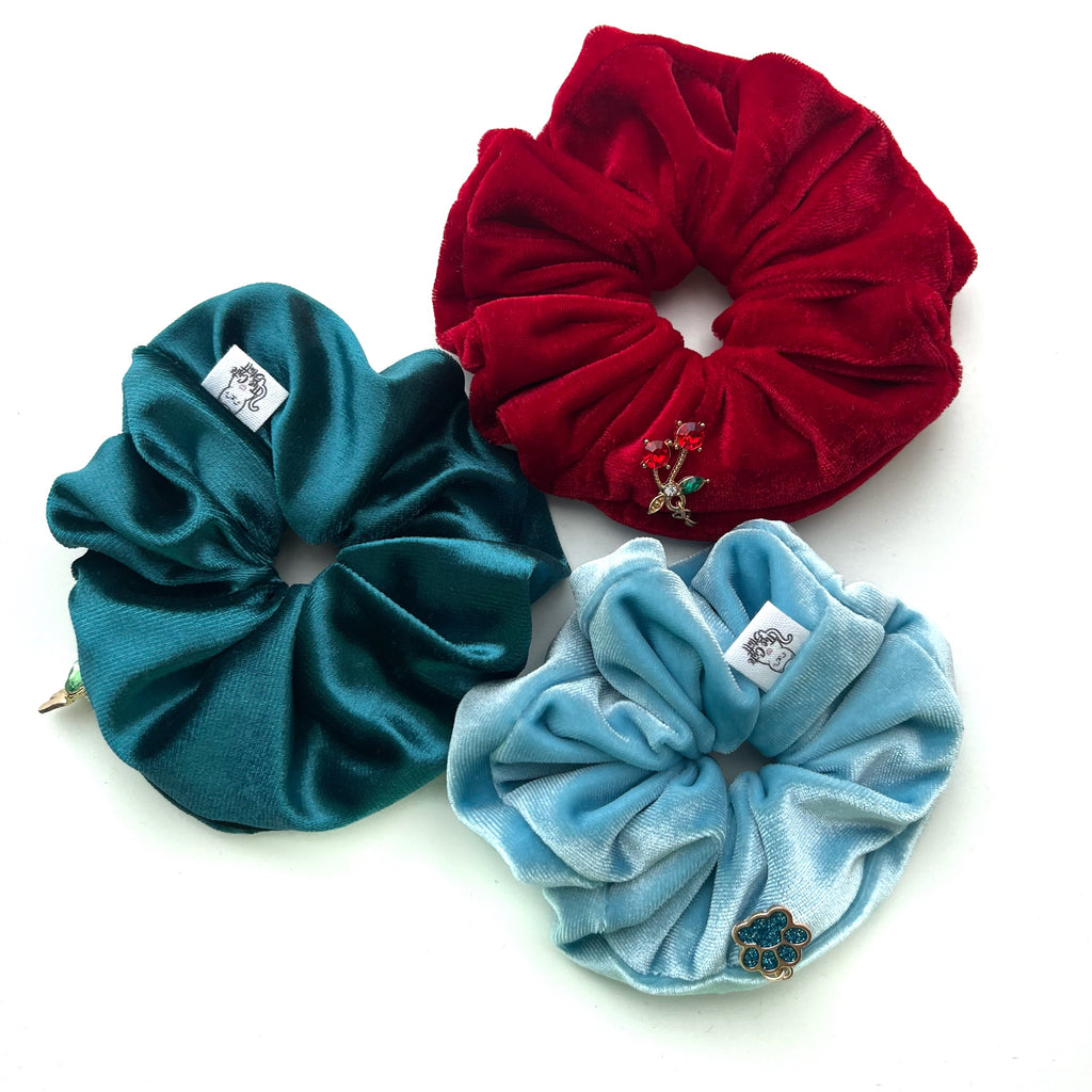 Three cute velvet scrunchies in red, blue, and teal on a white background. Scrunchies with inside zip pocket, gifts for her UK