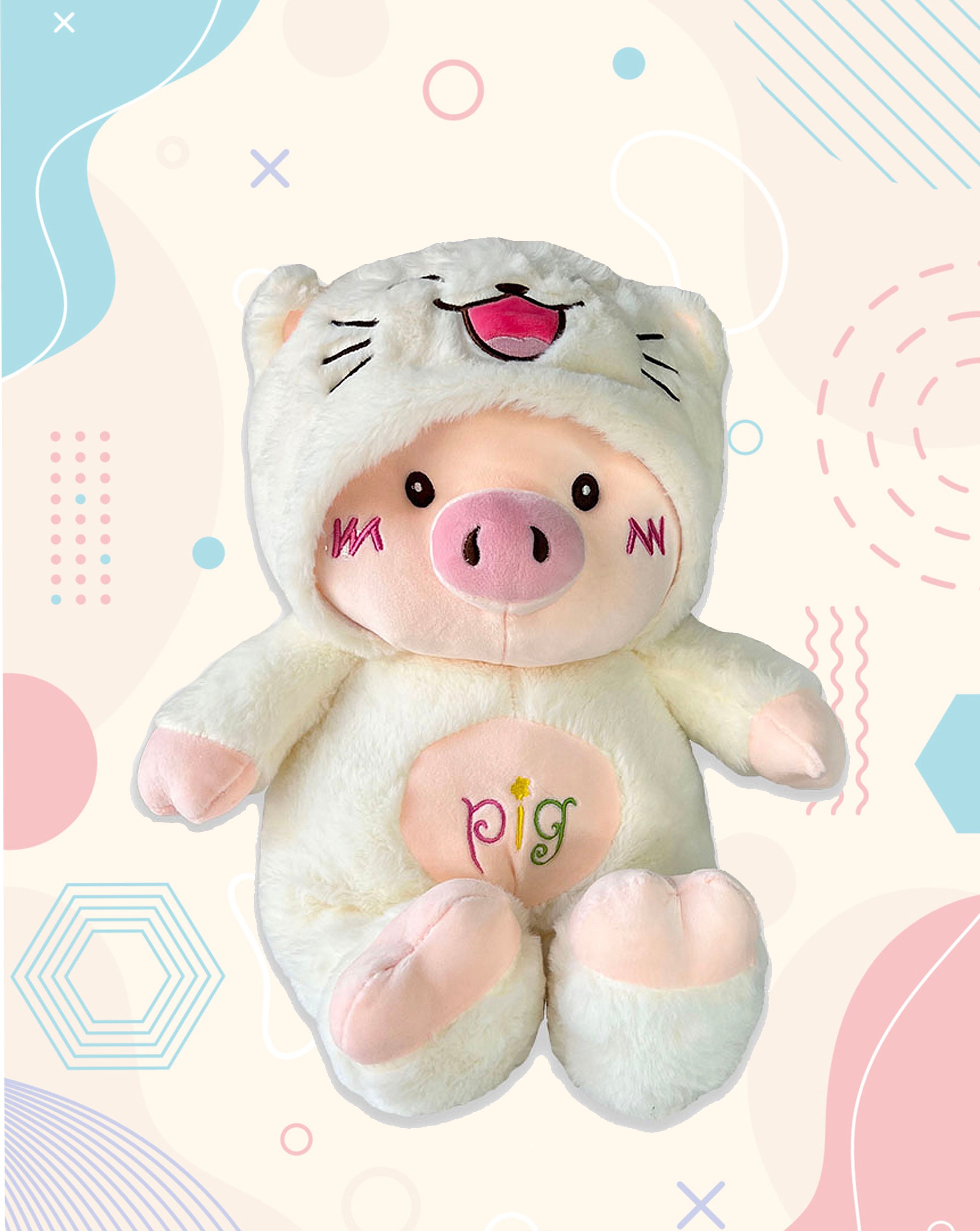 Plush toy pig with a cat hood on a colorful background